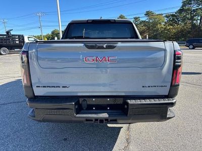 2026 GMC Sierra EV — rear three-quarter view