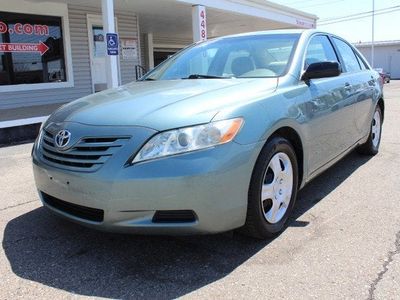 2009 Toyota Camry — rear three-quarter view