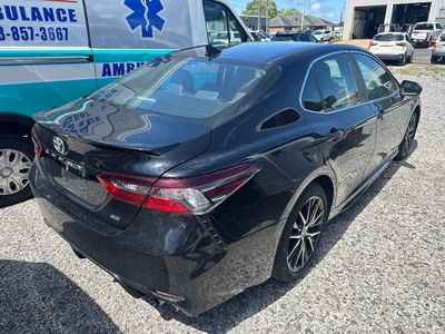 2024 Toyota Camry — rear three-quarter view