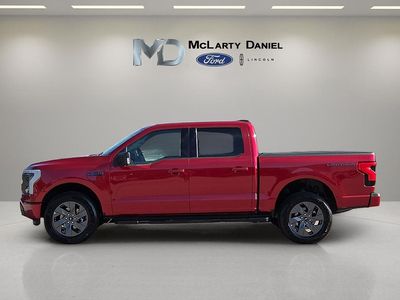 2025 Ford F-150 Lightning — rear three-quarter view