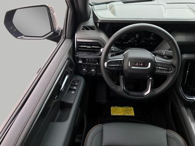 2026 GMC Yukon — rear three-quarter view