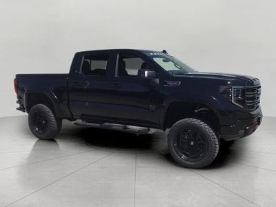 2026 GMC Sierra 1500 — rear three-quarter view
