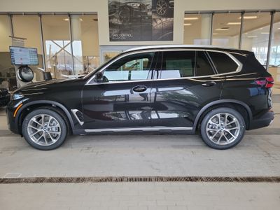 2026 BMW X5 — side profile view
