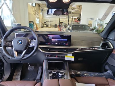 2026 BMW X5 — rear three-quarter view