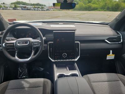 2026 GMC Acadia — rear three-quarter view