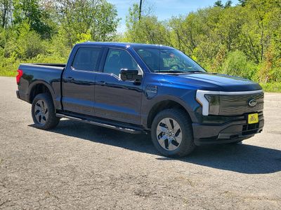 2023 Ford F-150 Lightning — rear three-quarter view