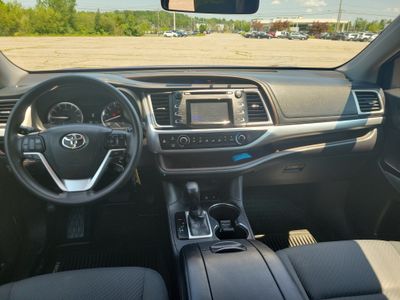 2016 Toyota Highlander — rear three-quarter view