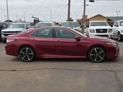 2018 Toyota Camry — rear three-quarter view