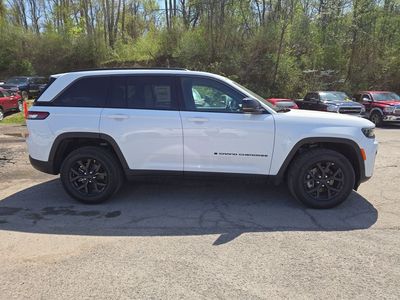 2026 Jeep Grand Cherokee — rear three-quarter view