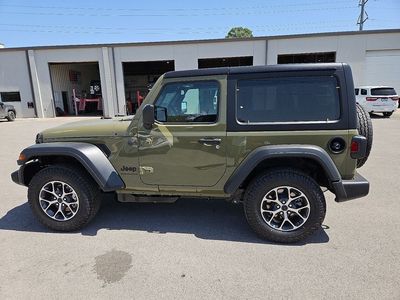 2026 Jeep Wrangler — rear three-quarter view