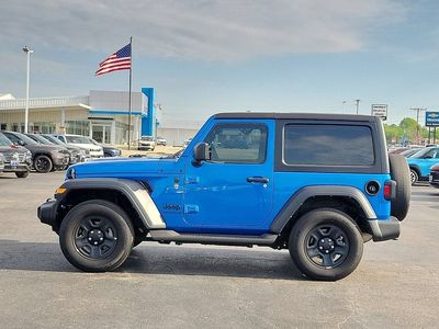 2023 Jeep Wrangler — rear three-quarter view