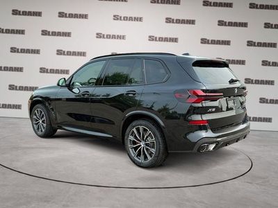 2026 BMW X5 — rear three-quarter view