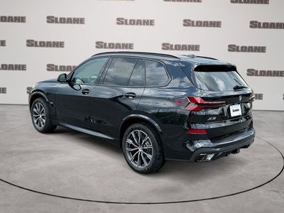 2026 BMW X5 — rear three-quarter view