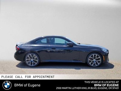 2024 BMW 230i xDrive — side profile view