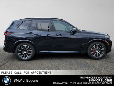2026 BMW X5 xDrive50e — side profile view