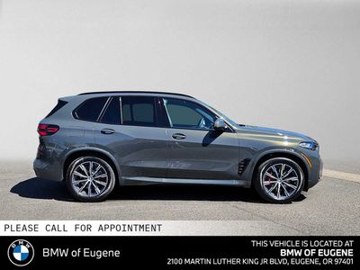 2026 BMW X5 xDrive50e — side profile view