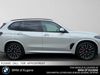 2026 BMW X5 xDrive50e — side profile view