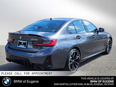 2026 BMW M340i xDrive — rear three-quarter view
