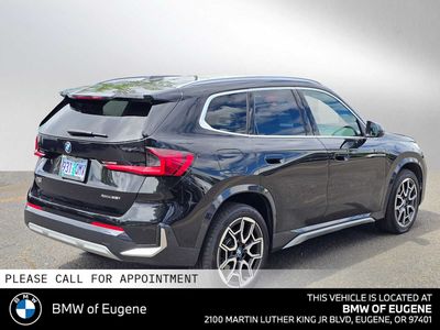 2025 BMW X1 xDrive28i — rear three-quarter view