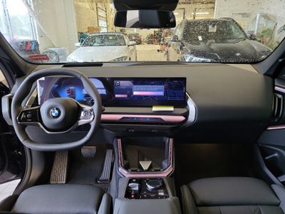 2026 BMW X3 — rear three-quarter view