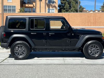 2026 Jeep Wrangler — rear three-quarter view