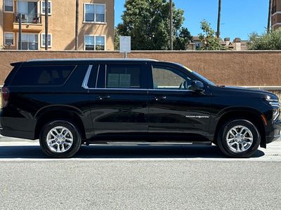 2025 Chevrolet Suburban — rear three-quarter view