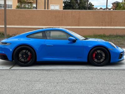 2024 Porsche 911 — rear three-quarter view