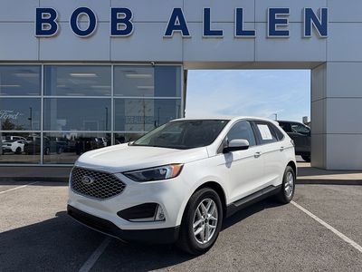 2023 Ford Edge SEL in Star White Metallic Tri-Coat — front three-quarter view