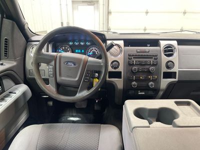 2013 Ford F-150 — rear three-quarter view