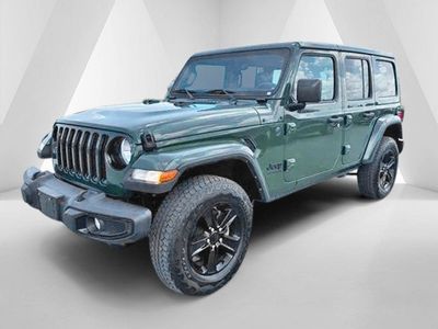 2023 Jeep Wrangler — rear three-quarter view