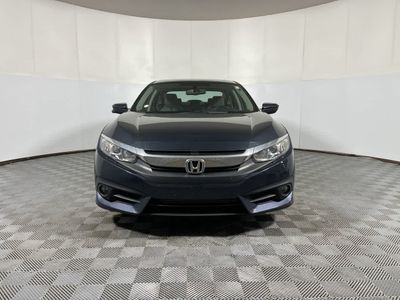 2016 Honda Civic Sedan — rear three-quarter view