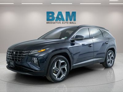 2024 Hyundai Tucson Plug-In Hybrid — rear three-quarter view
