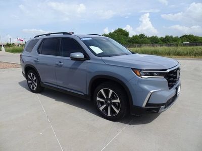 2025 Honda Pilot — rear three-quarter view