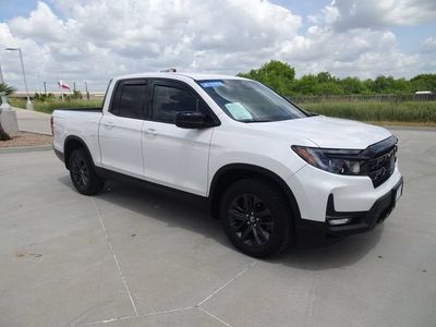 2024 Honda Ridgeline — rear three-quarter view