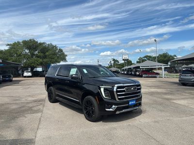 2026 GMC Yukon XL — rear three-quarter view