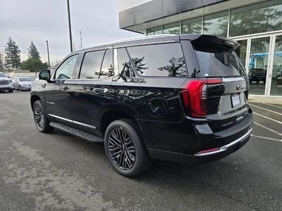 2026 GMC Yukon — rear three-quarter view