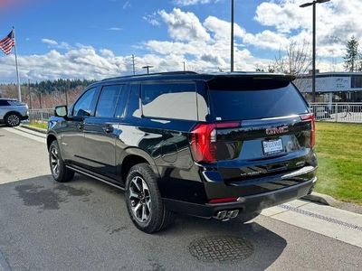 2026 GMC Yukon XL — rear three-quarter view