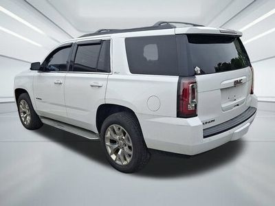 2015 GMC Yukon — rear three-quarter view