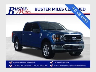 2023 Ford F-150 XLT in Blue Metallic — front three-quarter view