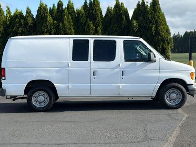 2004 Ford Econoline Cargo Van — rear three-quarter view