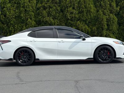 2021 Toyota Camry — rear three-quarter view