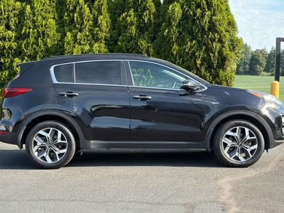 2021 Kia Sportage — rear three-quarter view