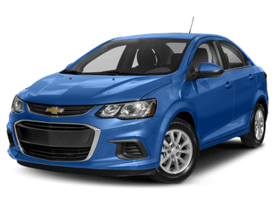 2018 Chevrolet Sonic LT in Summit White — front three-quarter view