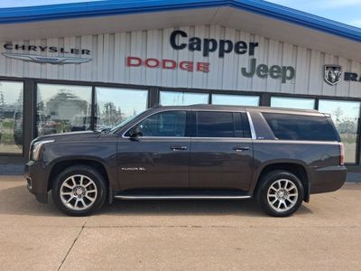 2017 GMC Yukon XL — rear three-quarter view
