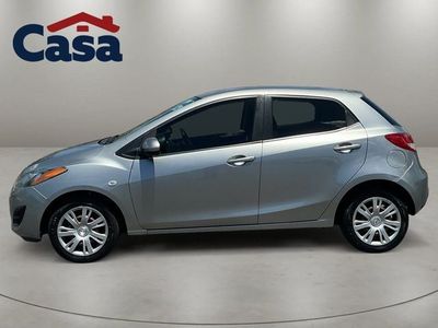 2011 Mazda Mazda2 — rear three-quarter view
