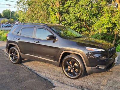 2016 Jeep Cherokee — rear three-quarter view