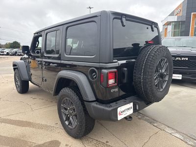 2025 Jeep Wrangler — rear three-quarter view