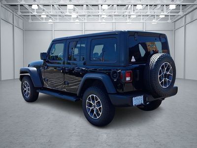 2026 Jeep Wrangler — rear three-quarter view