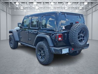 2026 Jeep Wrangler — rear three-quarter view