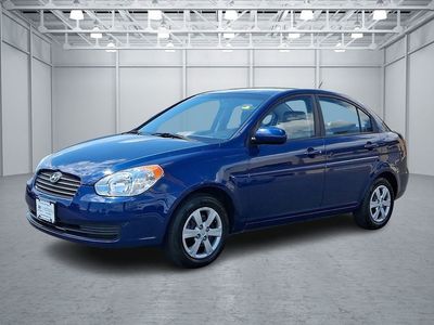 2010 Hyundai Accent — rear three-quarter view